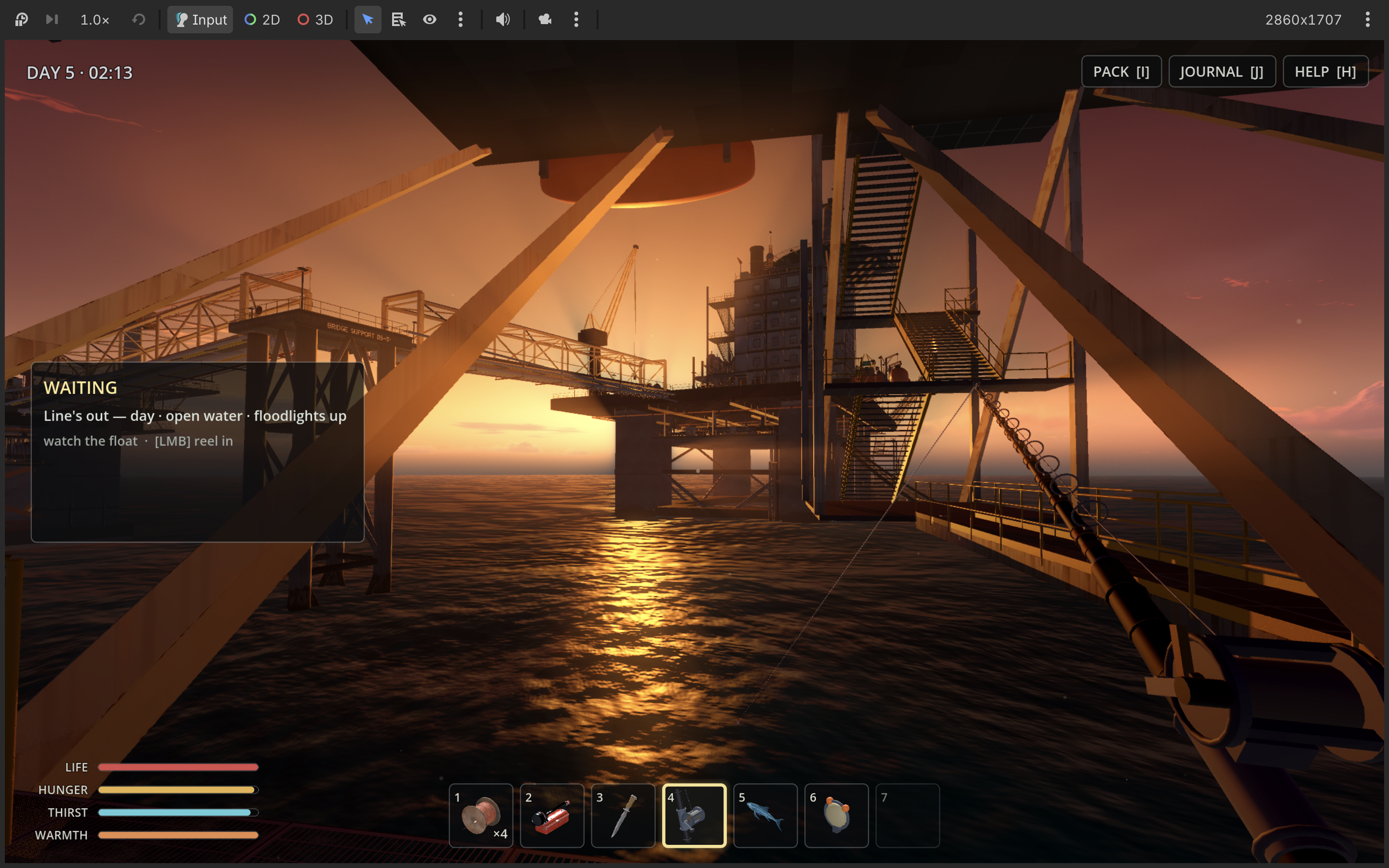 A fishing rod cast from a platform deck as sunset lights the surrounding bridges